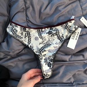 NWT Fantasie white black purple floral thong